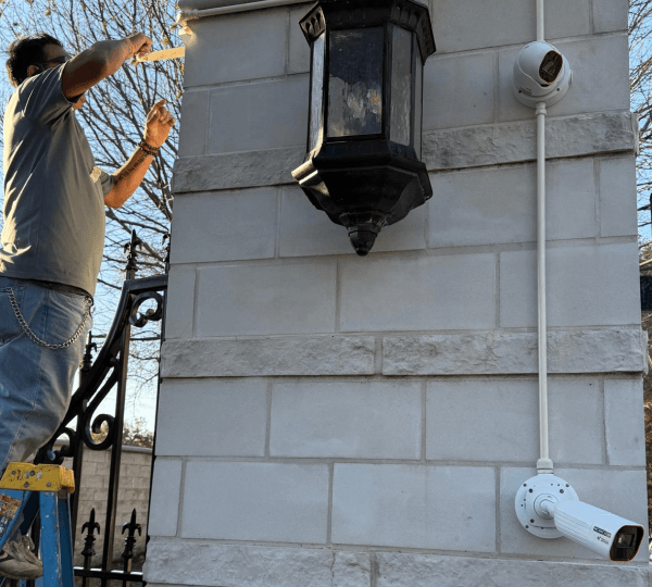 Residential security system installation at Dallas community gate