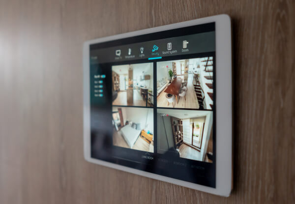 Smart home wall panel with security camera feeds