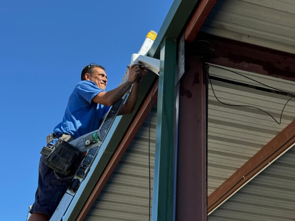 Commercial security camera installation on a Waco building exterior