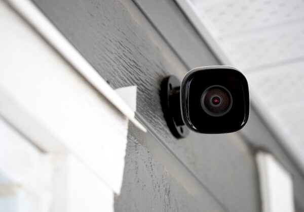 Outdoor commercial security camera mounted on a building exterior