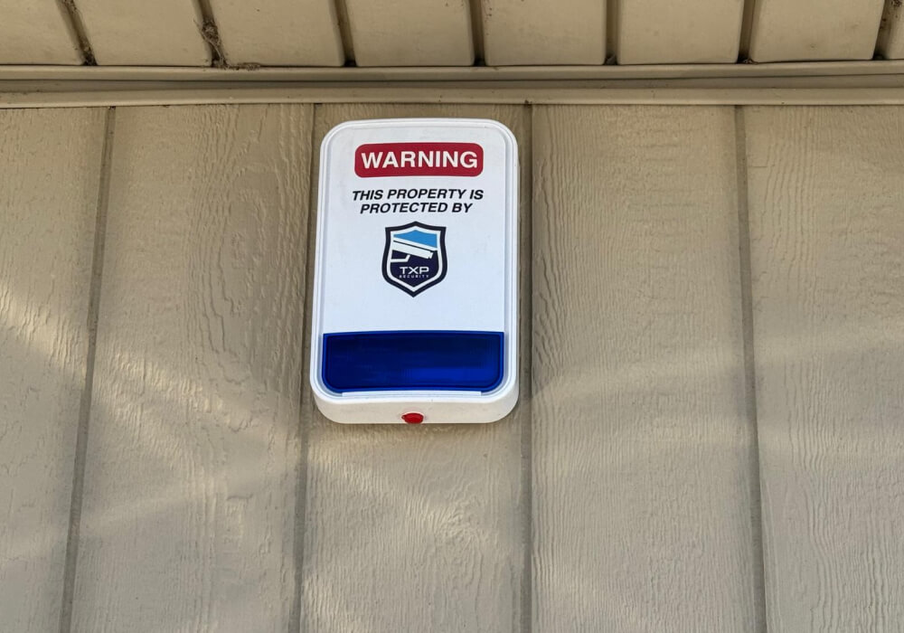 Commercial alarm siren by TXP Security on Dallas property
