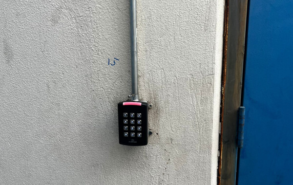 Keypad access control reader on a Killeen commercial door