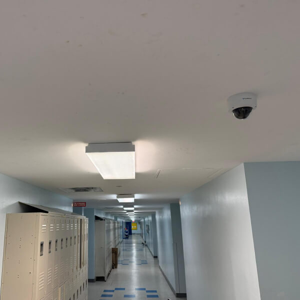 Security cameras integrated with access control in a Tyler hallway