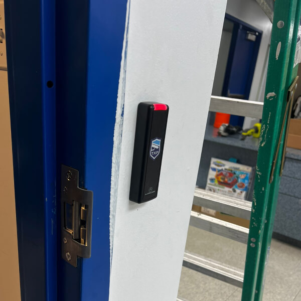 TXP Security access control reader on an Austin business door