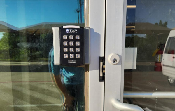 TXP Security keypad access control reader on a Tyler door